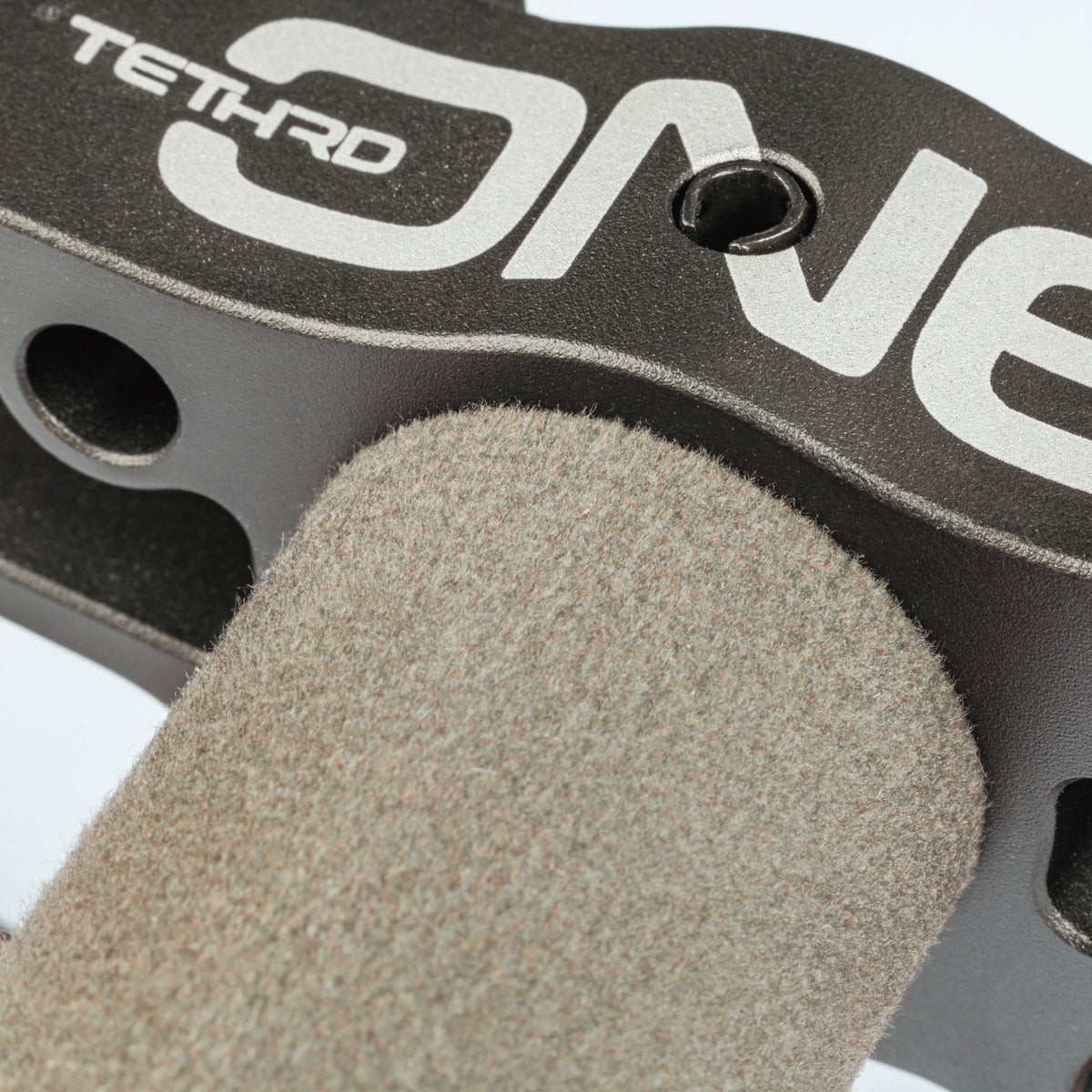 Close-up of Deadfall WhisprTuff Tape texture on a One Stick standoff